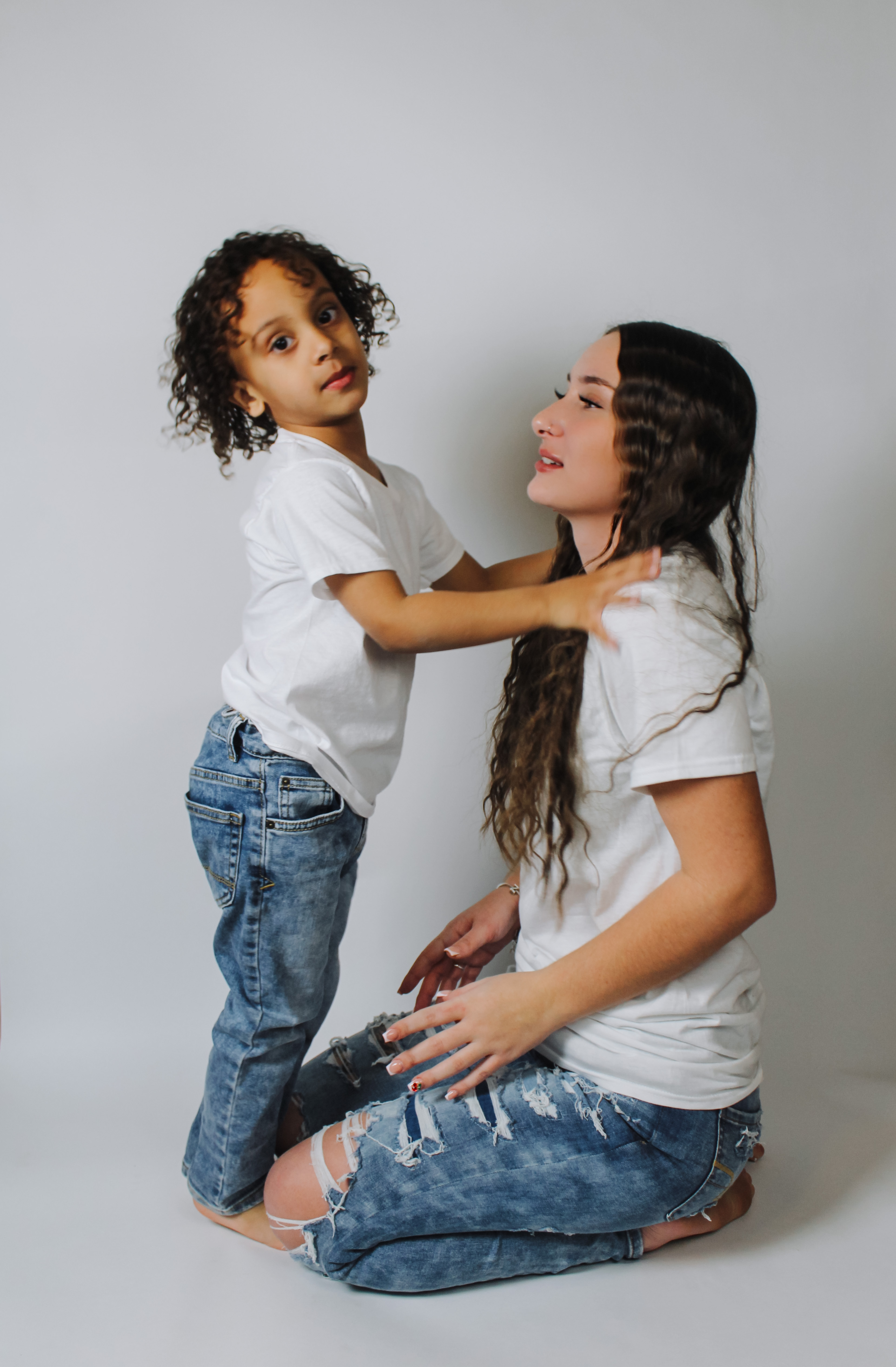 Birthday shoot, mom and child studio photo, candid family moment